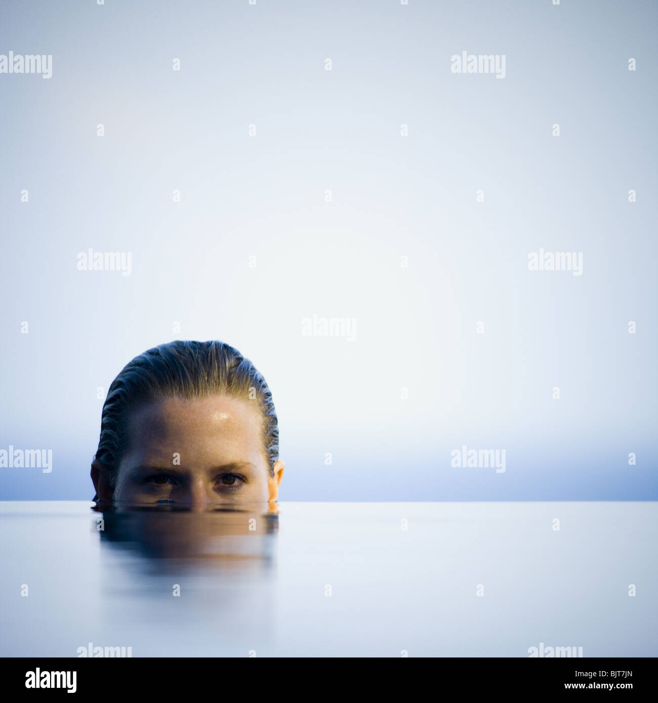 Portrait of a young woman in water Stock Photo - Alamy
