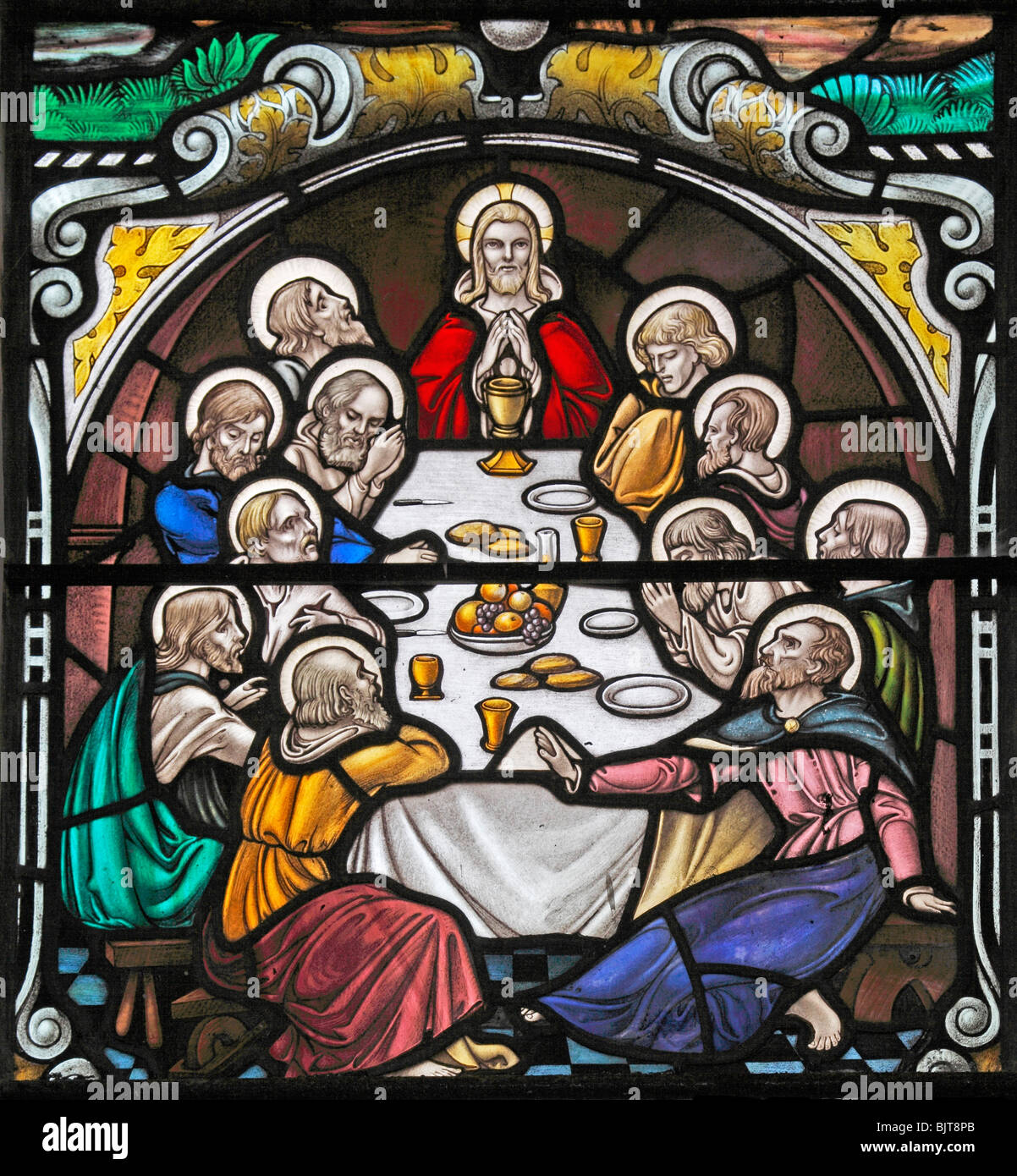 Detail from a stained glass window by William Morris & Co, depicting The Last Supper, St Mary's Church, South Walsham, Norfolk Stock Photo