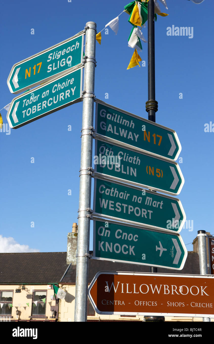 roadsigns in the square on main street Charlestown county mayo republic of ireland Stock Photo