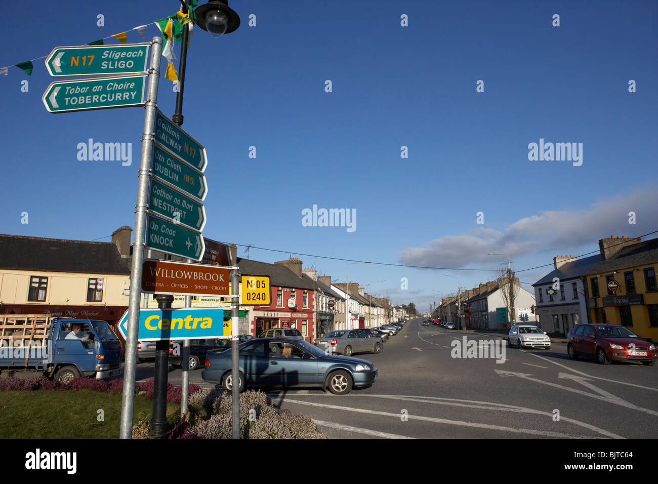 roadsigns in the square on main street Charlestown county mayo republic of ireland Stock Photo