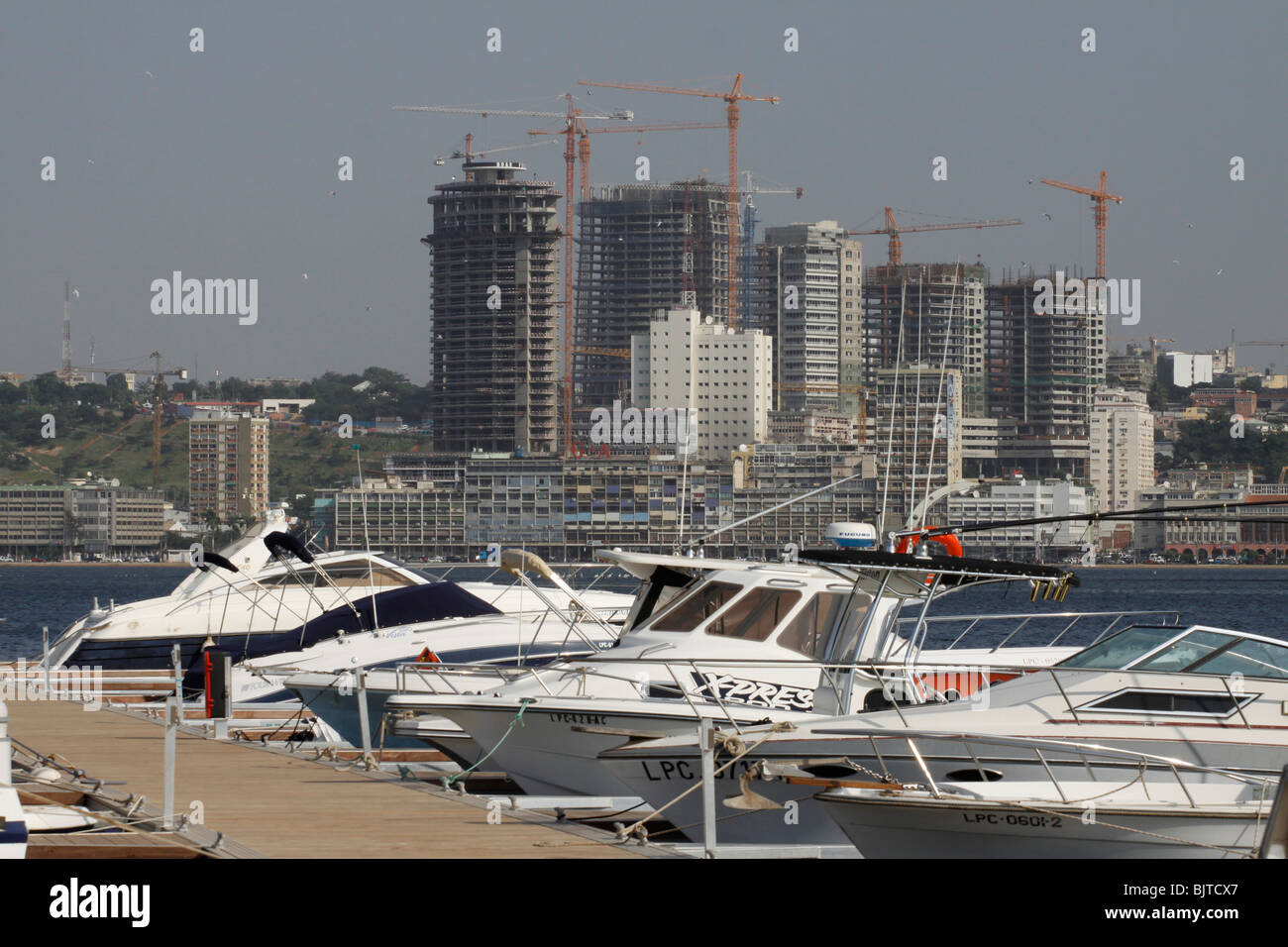 The Sonangol oil company headquarters seen from across the harbour from the Ilha. Luanda. Angola. Africa Stock Photo