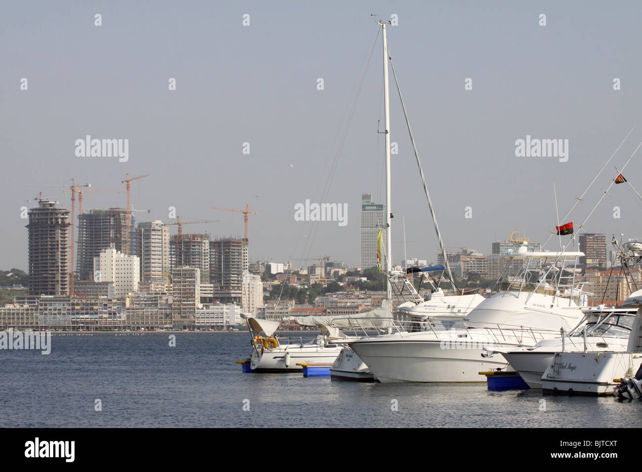 The Sonangol oil company headquarters seen from across the harbour from the Ilha. Luanda. Angola. Africa Stock Photo