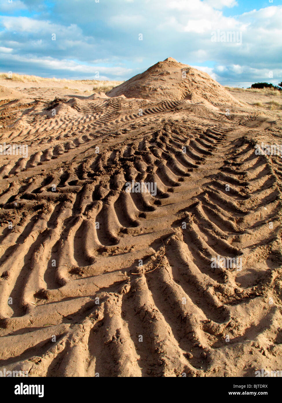 Lorry tyre / tire marks leading to a sand quarry. Stock Photo