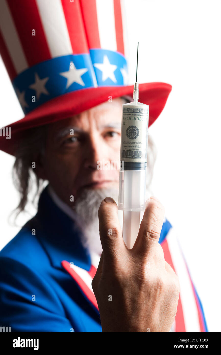 Man in Uncle Sam's costume holding syringe with us dollar banknote inside, studio shot Stock Photo