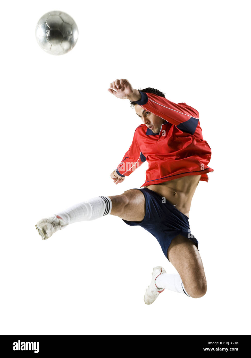 Man jumping for soccer ball Stock Photo Alamy