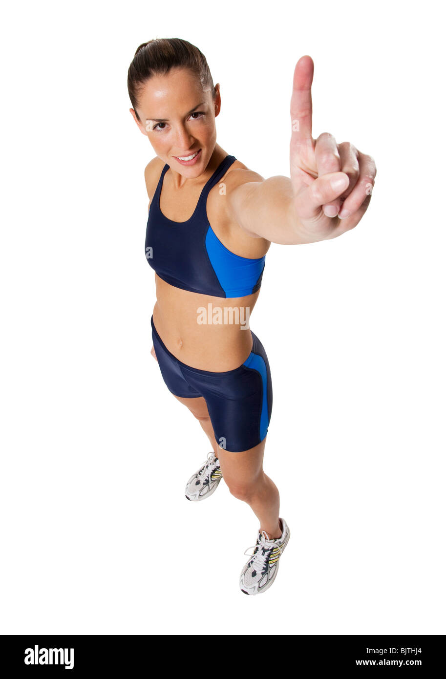 Woman athlete holding medal and making hand gesture Stock Photo