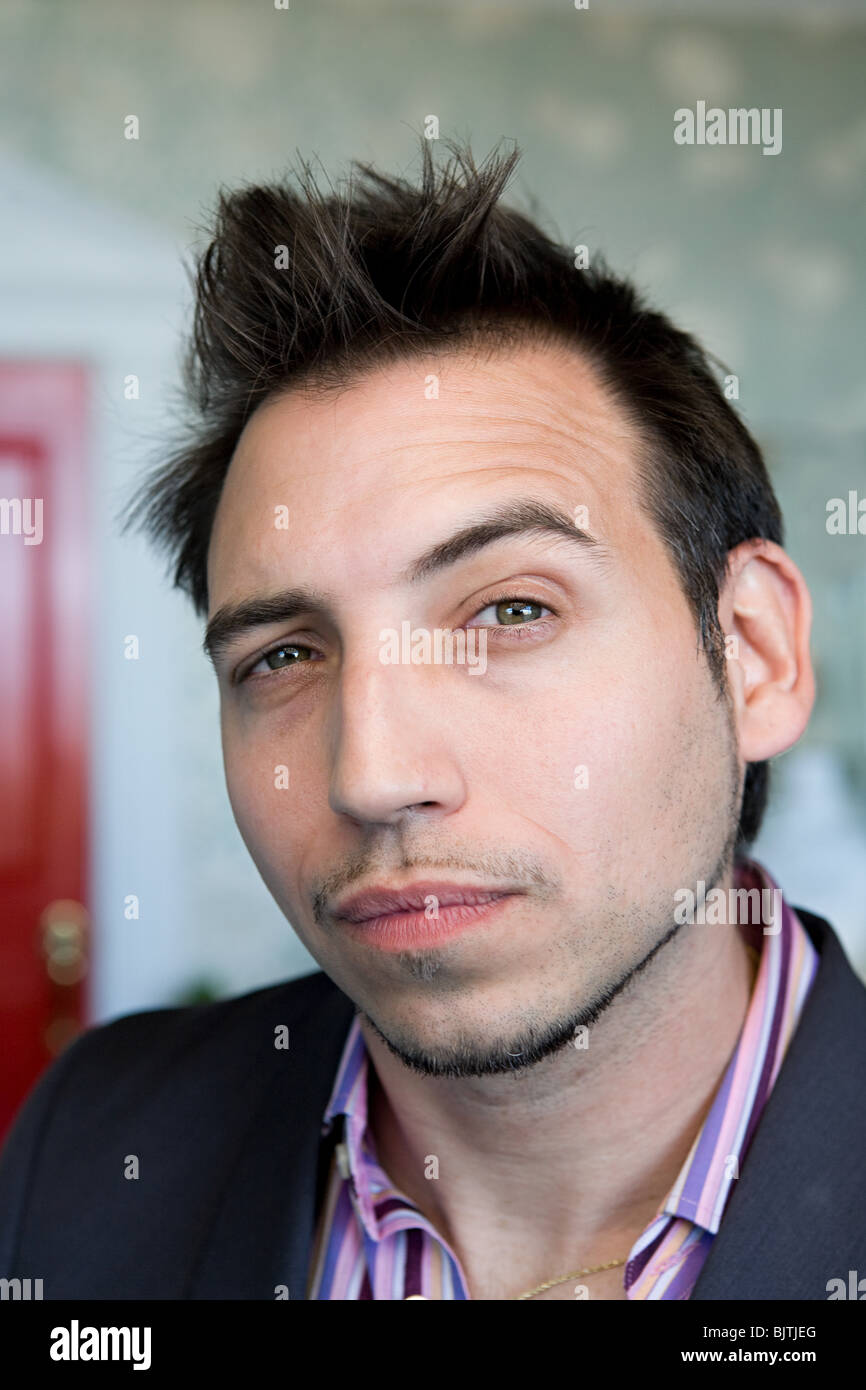 Man with raised eyebrow Stock Photo Alamy