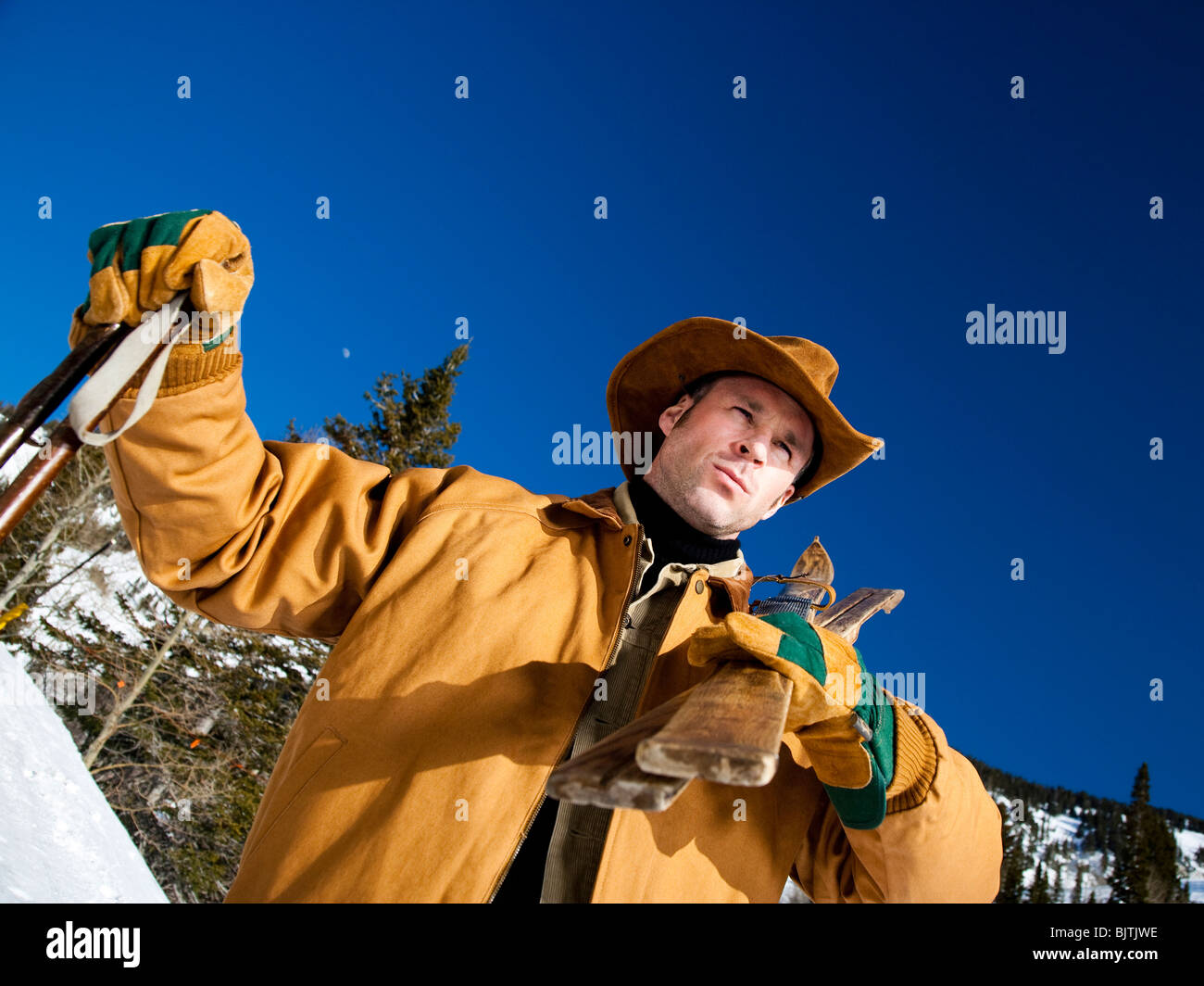 Man with cross country skis Stock Photo