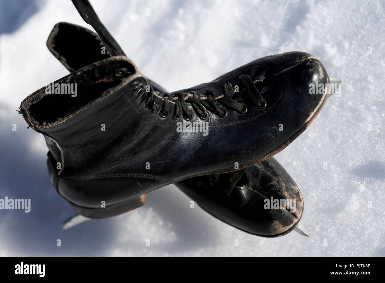 Old pair of black figure skates Stock Photo Alamy