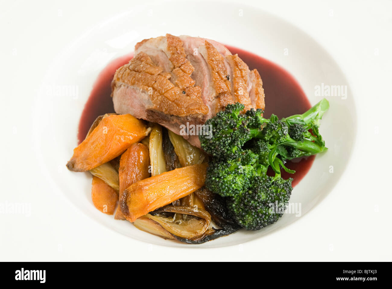Roast duck with vegetables and jus Stock Photo Alamy