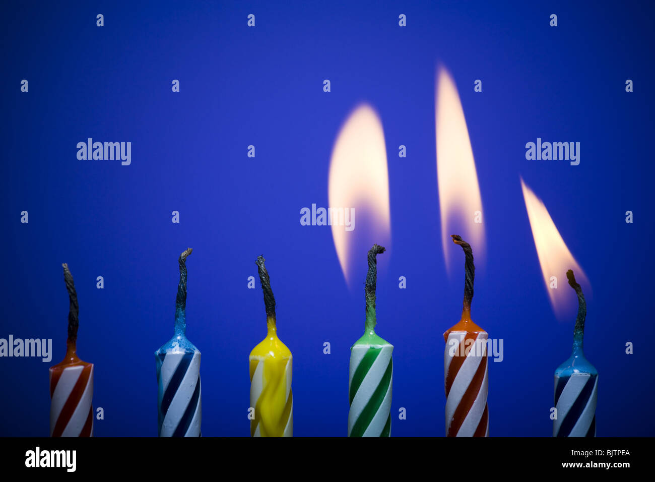 Six burning birthday candles Stock Photo Alamy