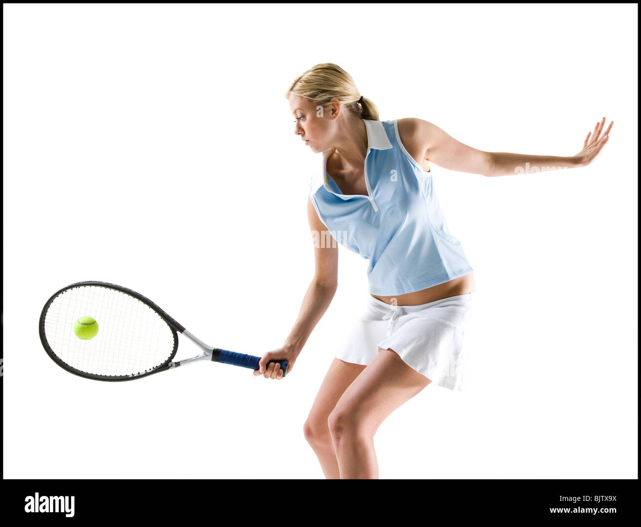 Tennis player hitting ball Stock Photo Alamy