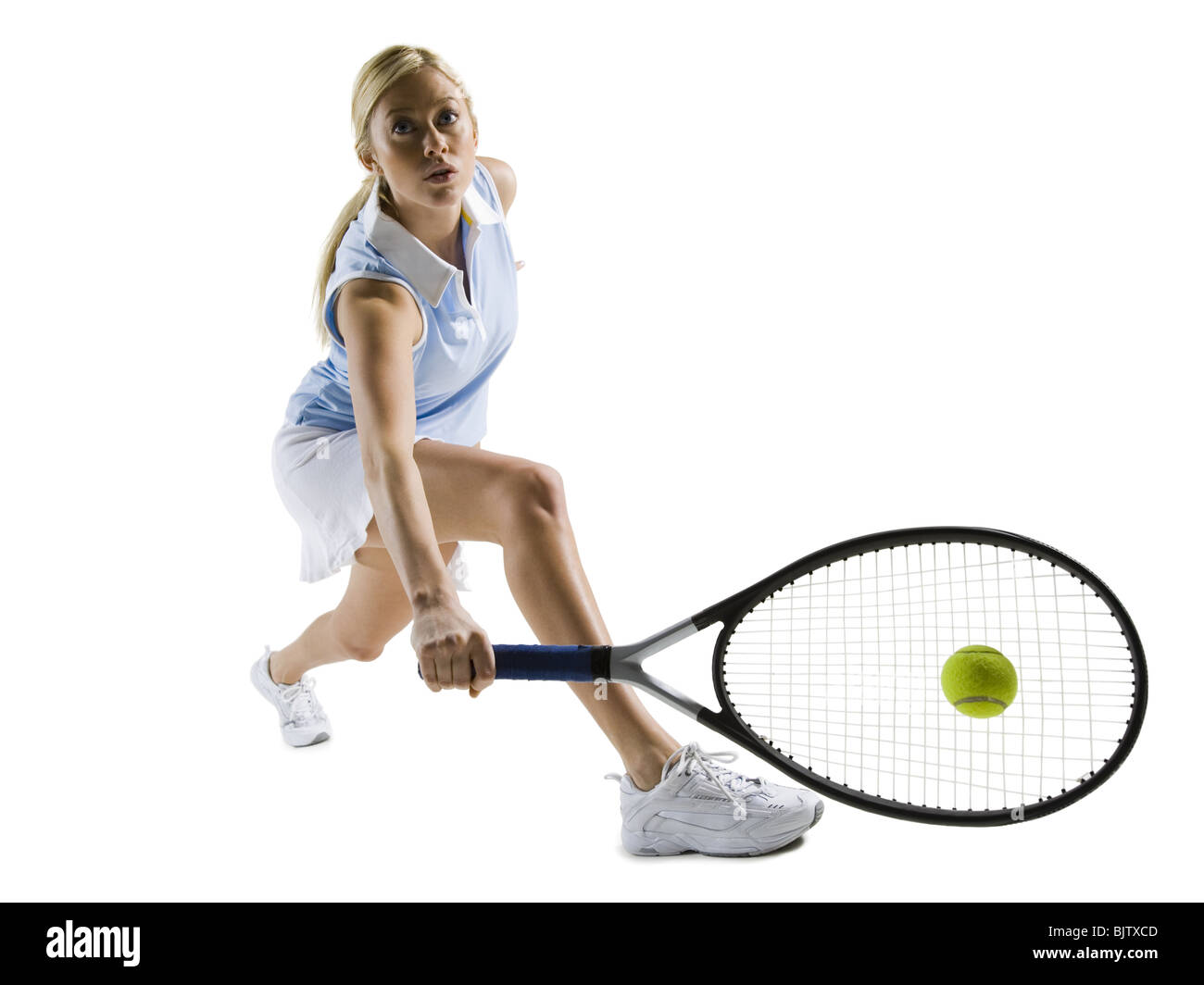 Close-up of tennis player hitting ball Stock Photo