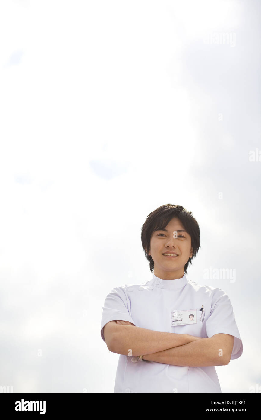 Nurse smiling standing in hi-res stock photography and images - Alamy