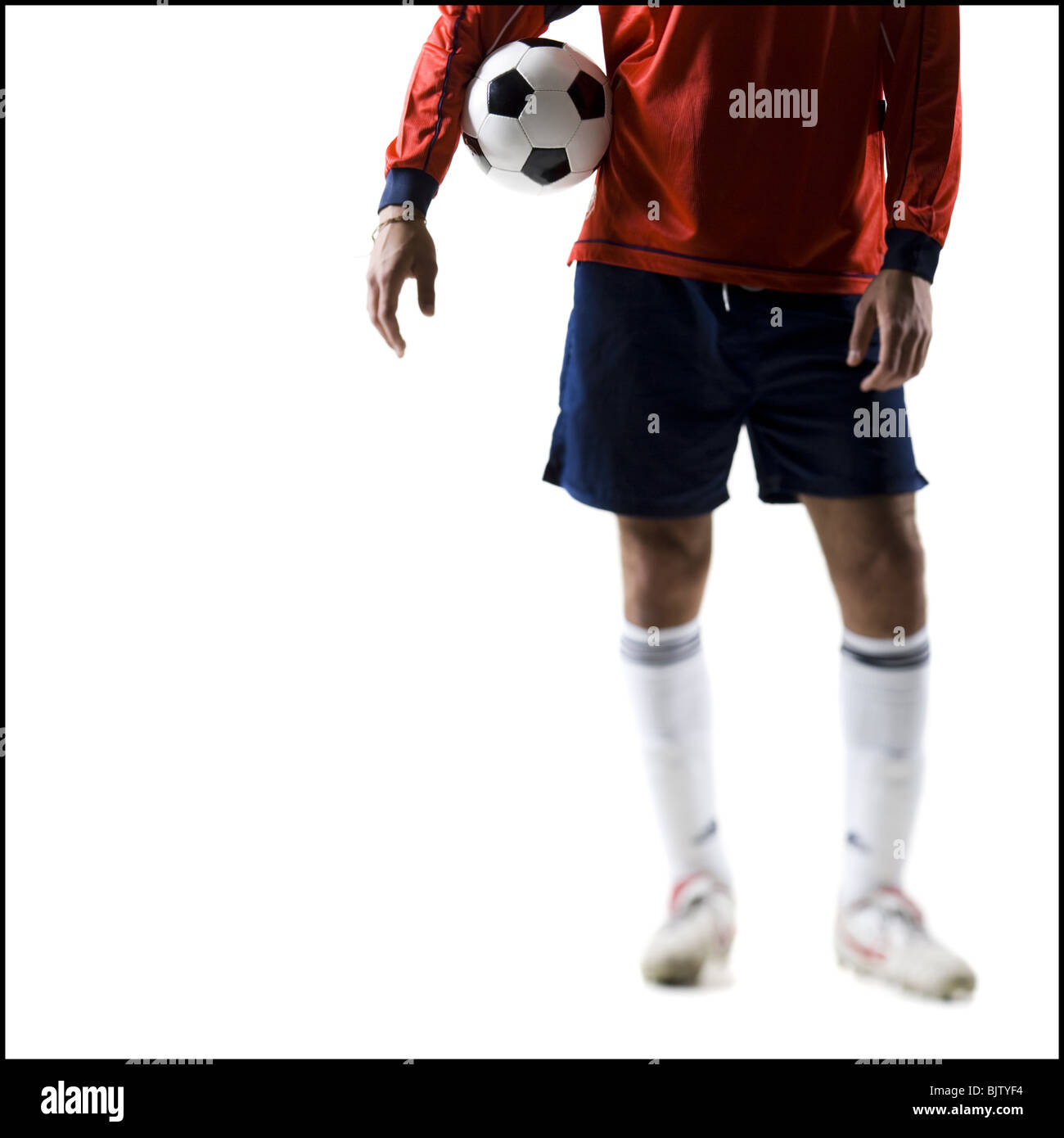 Soccer player holding groin Stock Photo