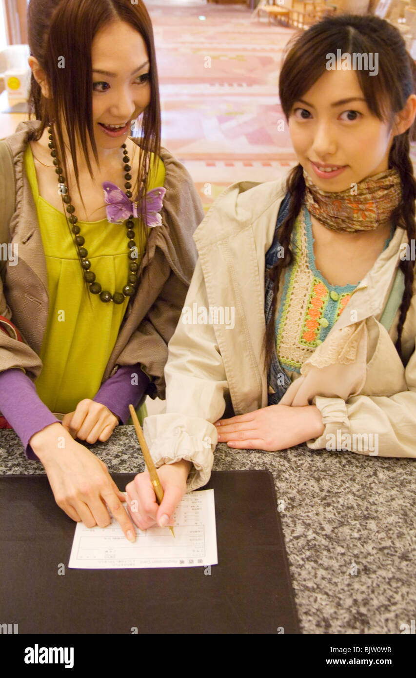 Women arrives hi-res stock photography and images - Alamy