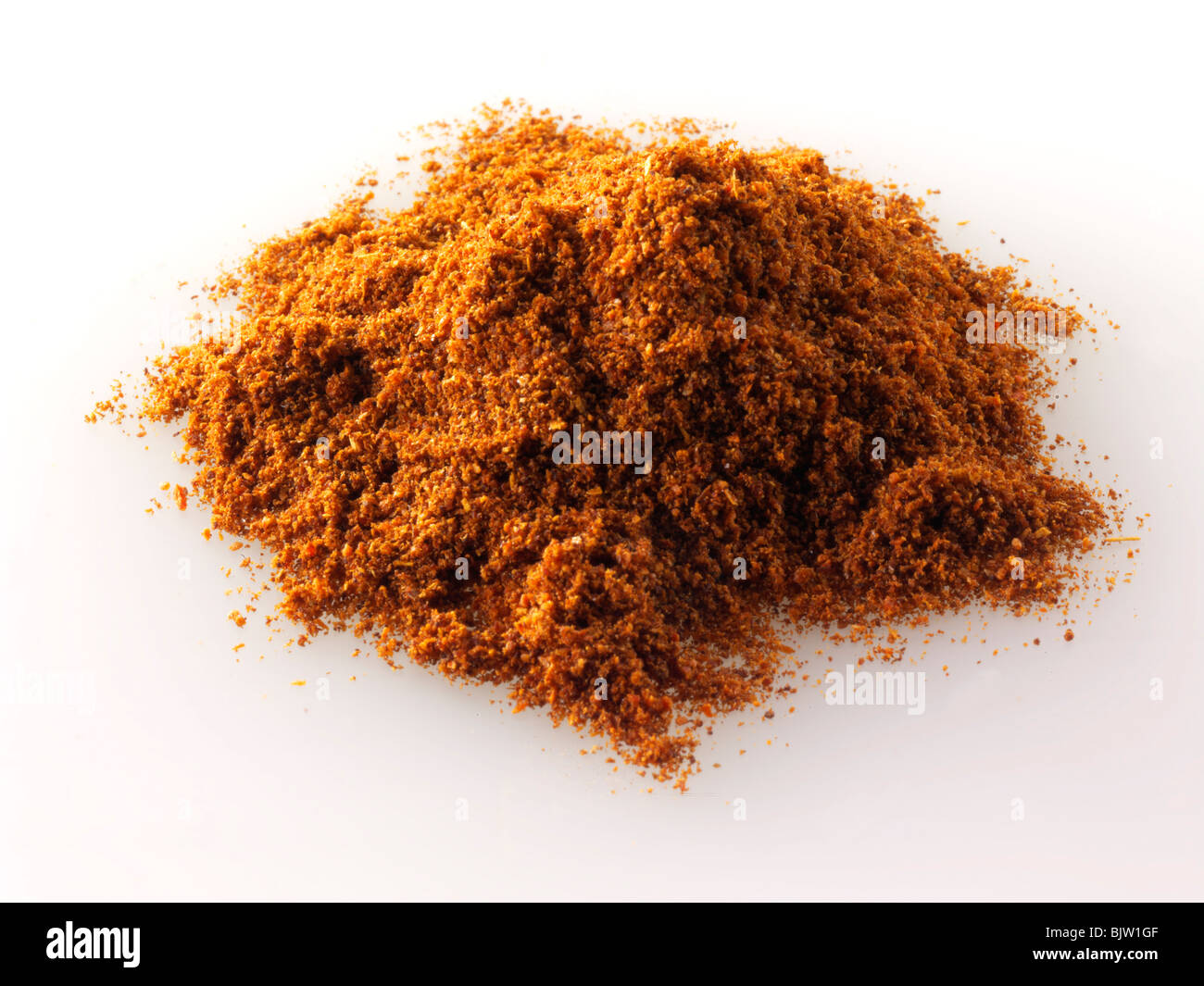 pile of Ground cayenne pepper composed arrangement isolated against a white background Stock Photo