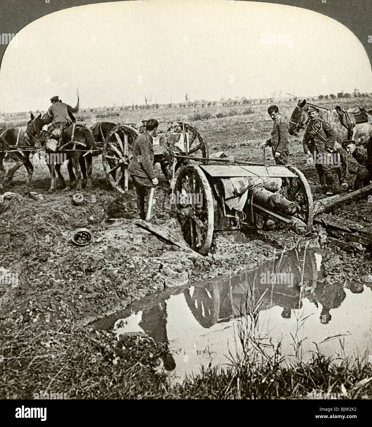 Removing a field gun from a flooded position, World War I, 1914-1918.Artist: Realistic Travels Publishers Stock Photo
