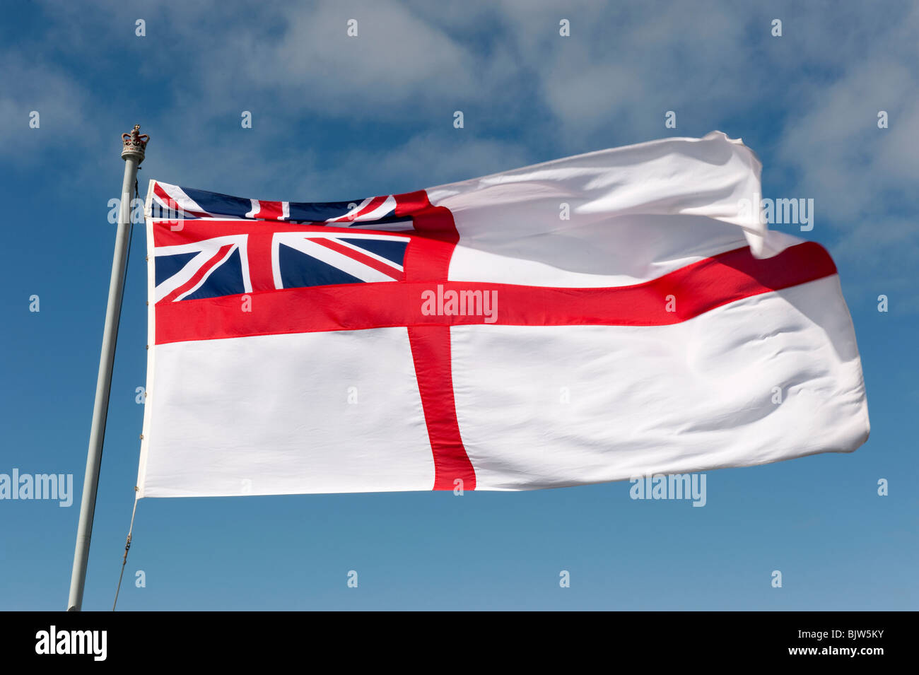Royal Navy Royal Standard Flag against blue sky Stock Photo