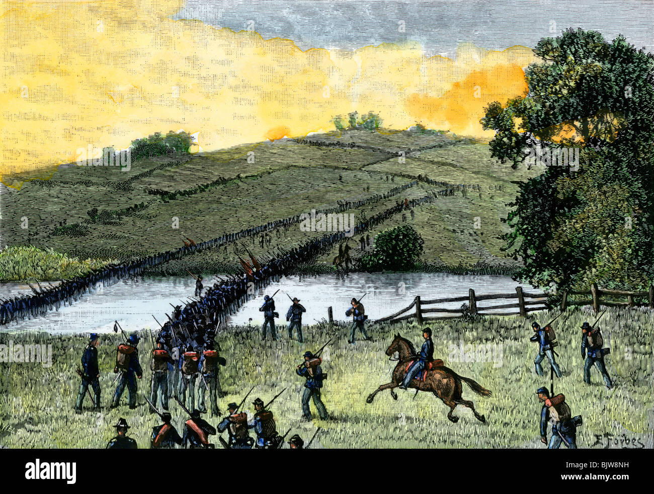 General Doubleday's division crossing below Burnside Bridge, Battle of Antietam, 1862. Hand-colored woodcut Stock Photo