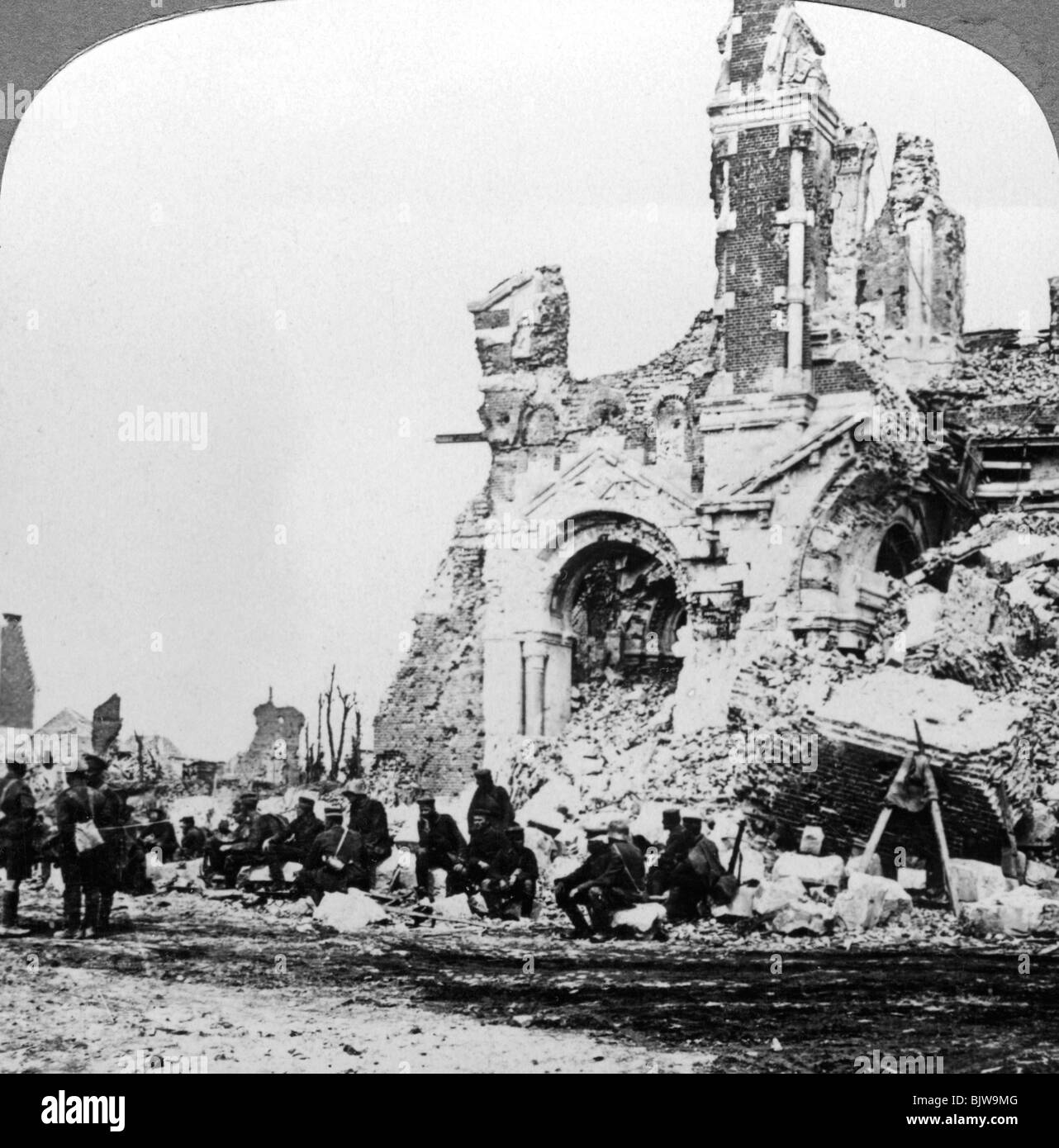 German prisoners of war beside the ruins of the basilica of Albert, France, World War I, 1914-1918.Artist: Realistic Travels Publishers Stock Photo