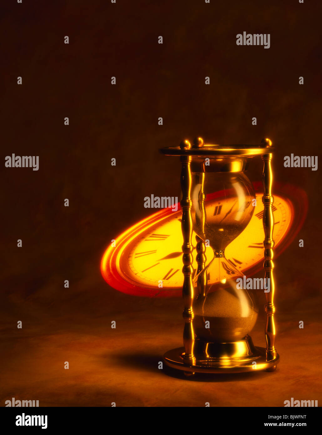 Hour glass with Projected Clock Face Stock Photo