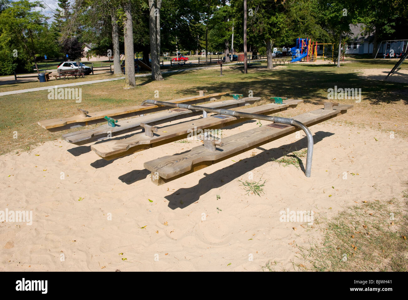teeter totter is an example of perfect balance Stock Photo Alamy