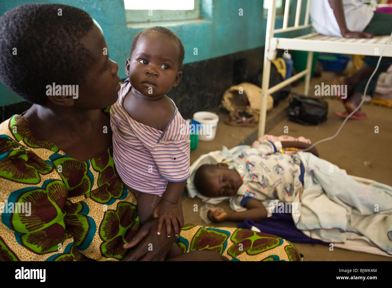 A woman with her children in hospital in Amuria District, Teso Subregion, Uganda, East Africa. Stock Photo