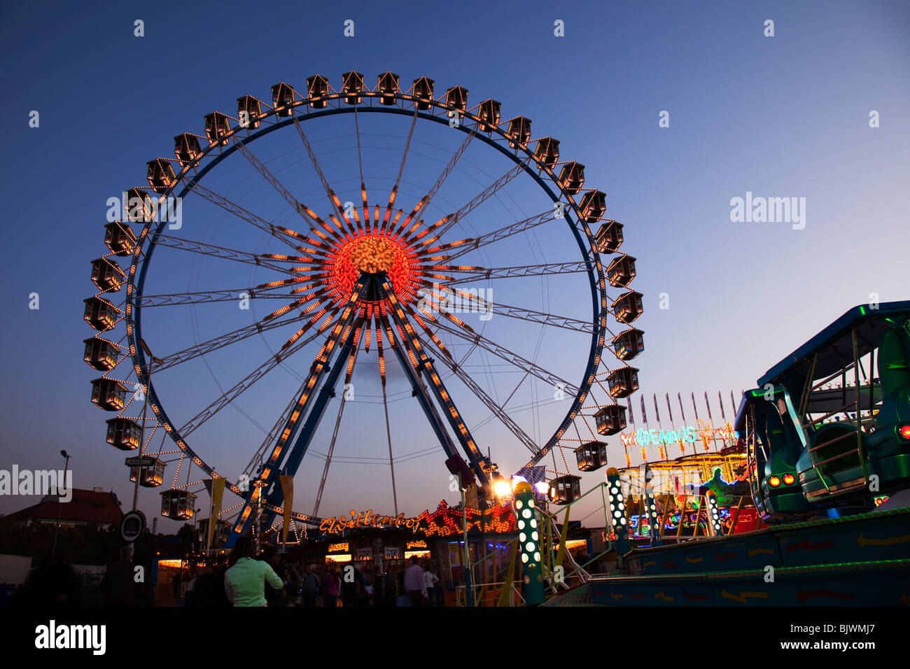 Ferris Wheel at dusk at the Oktoberfest, Munich Beer Festival, Munich ...