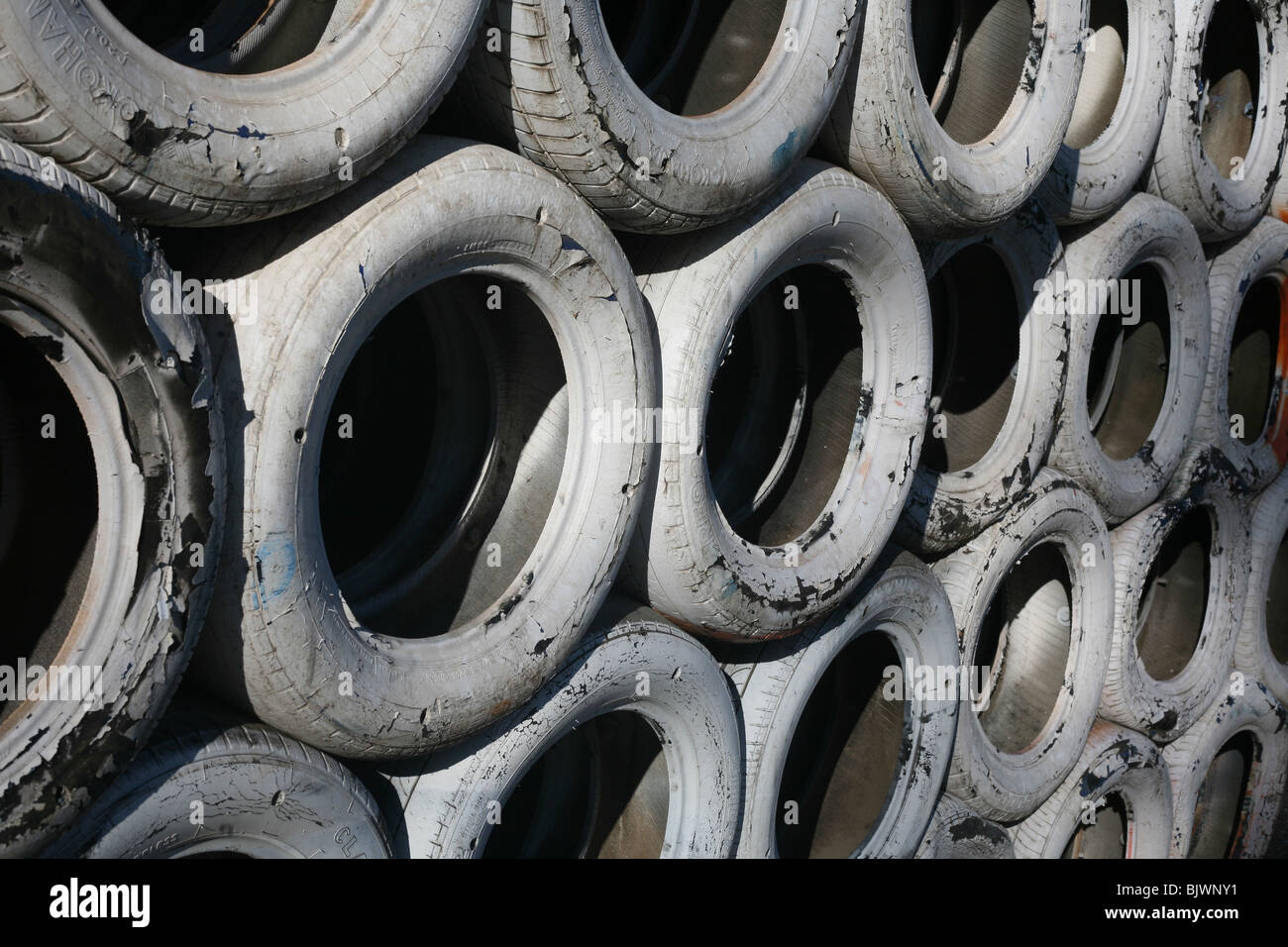 Rows of tires as a crash barrier at the grand prix Formula One Stock Photo