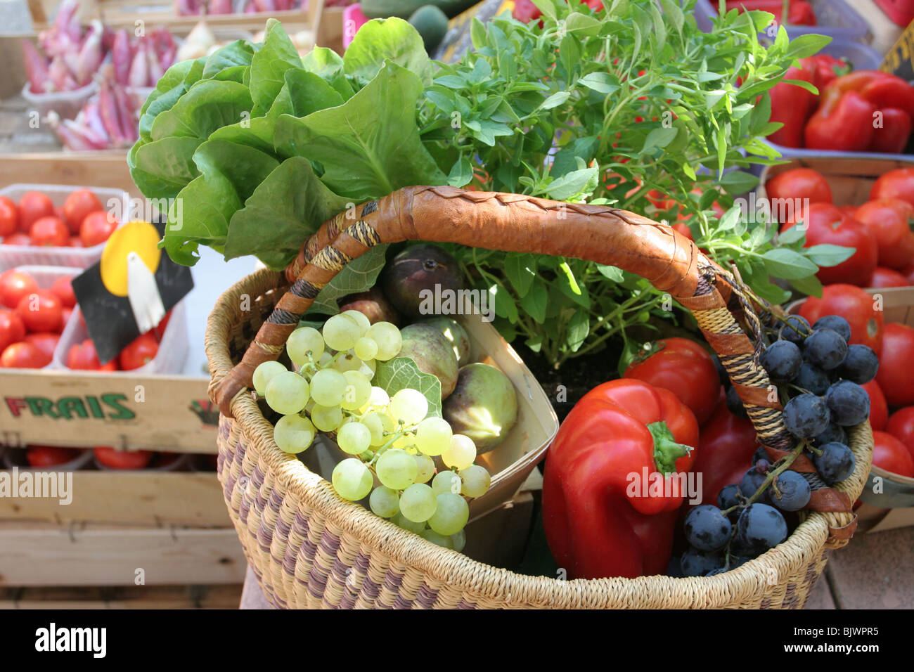 Fruit and vegetable basket at the market in Sarrians, Vaucluse, Provence,  France Stock Photo - Alamy
