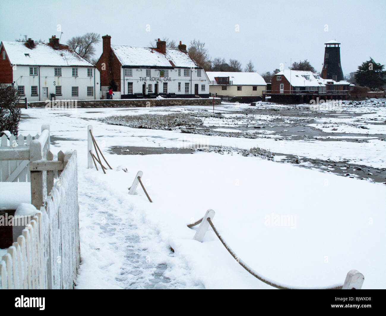 The Royal Oak and Mill, Langstone, in the snow Stock Photo