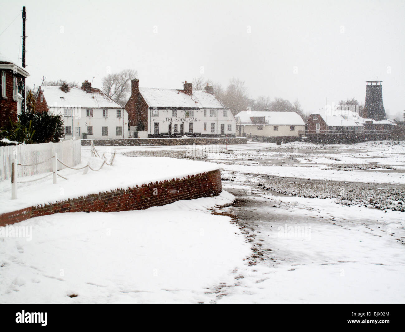 The Royal Oak and Mill, Langstone, in the snow Stock Photo