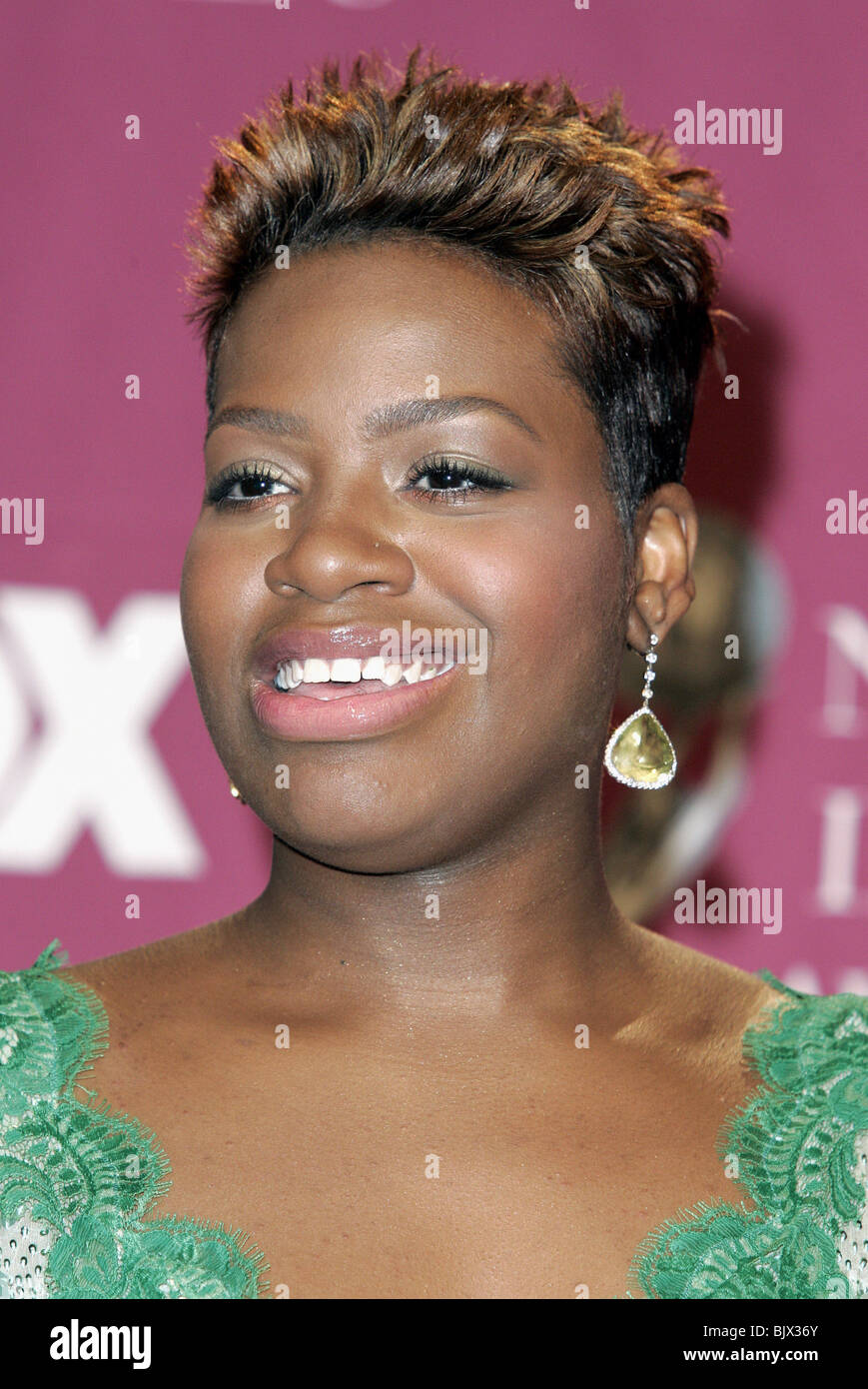 Bahja Rodriguez Belly Button Piercing