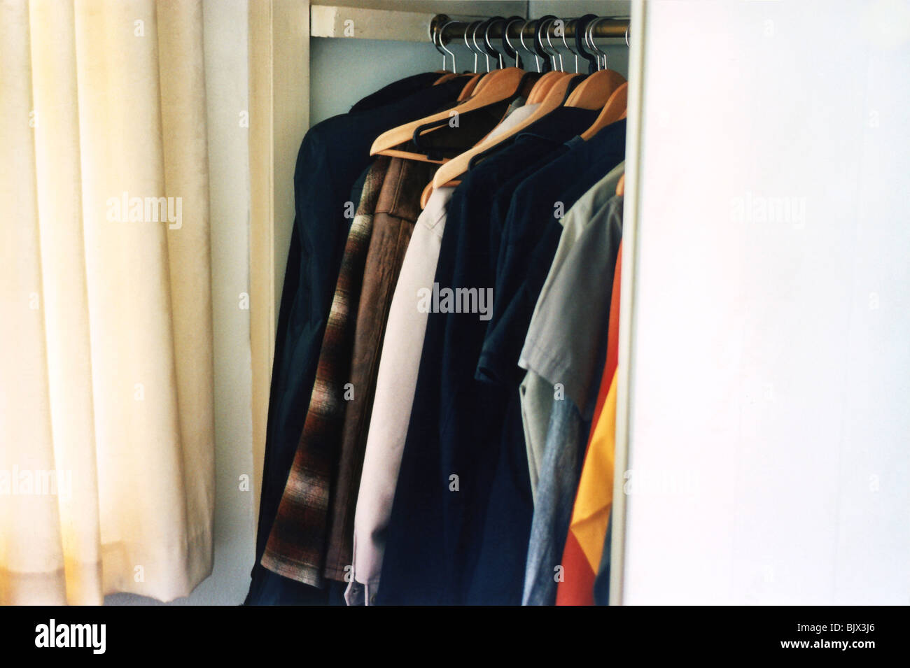 Wardrobe and clothes, interior, Fulham, England Stock Photo Alamy