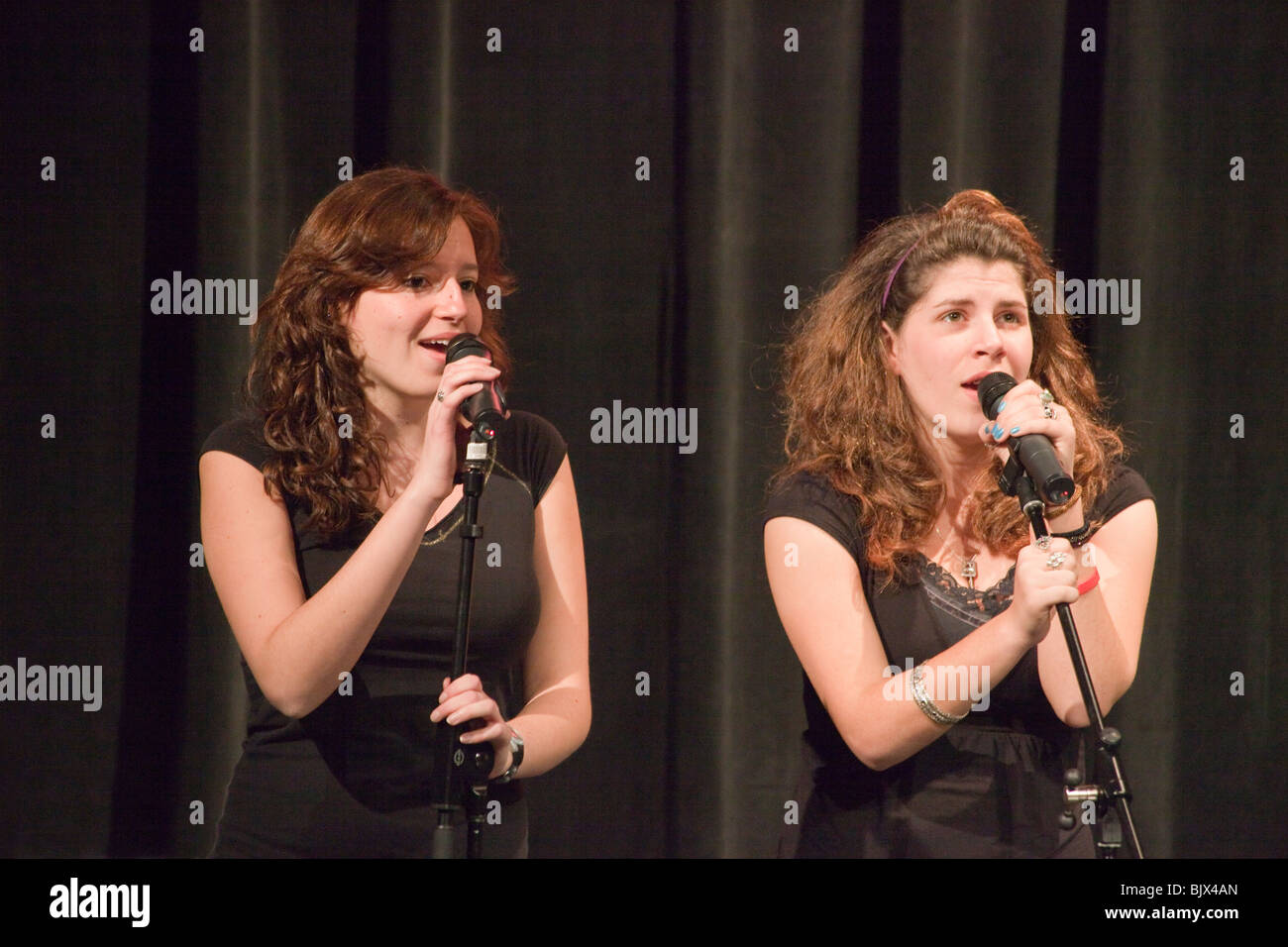high school girls singing in talent show at theatre, Cairo American College, Cairo, Egypt Stock Photo