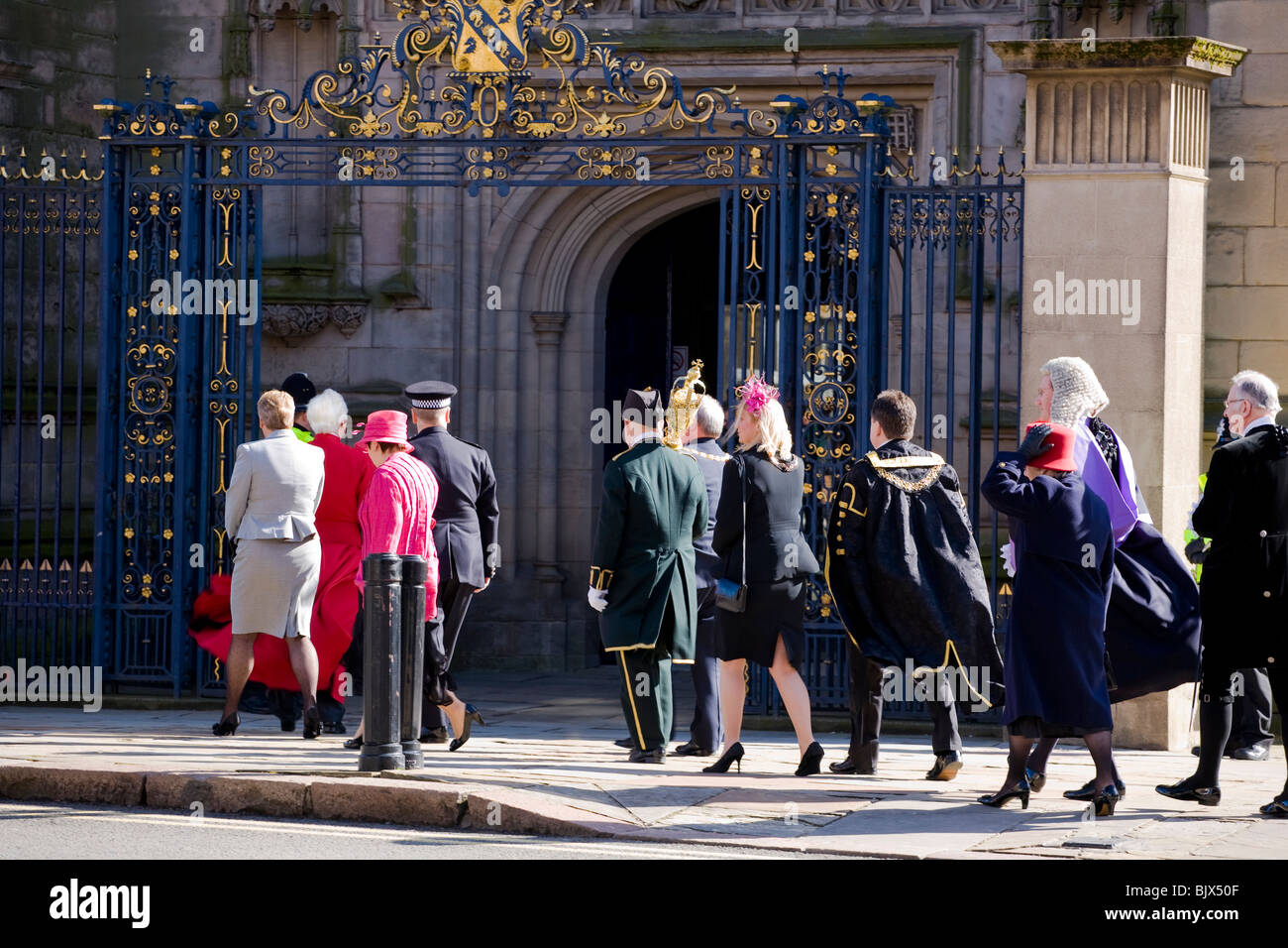 The mayor and other dignitaries enter Derby Cathedral for the start of a Maundy Easter ceremony where The Queen is to attend. Stock Photo