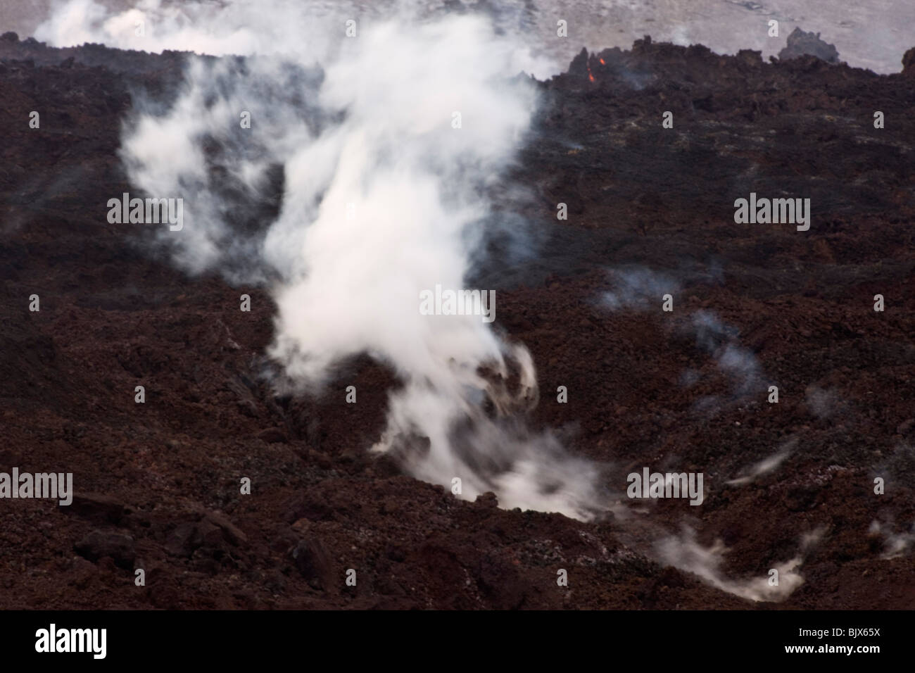 Volcanic eruption at Fimmvorduhals in Eyjafjallajokull. Poisoned gas cover from the hot lava, Iceland - Stock Photo