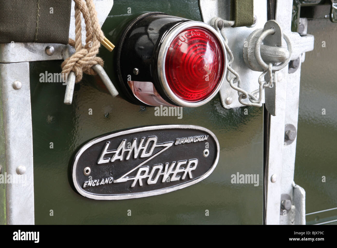 Detail of well restored Land Rover Series One rear light and badge Stock Photo