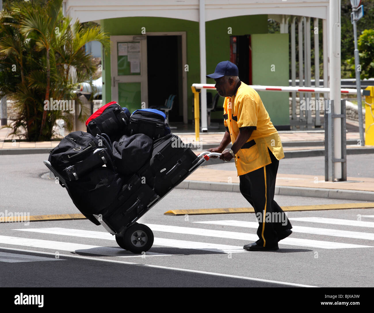 Baggage porter in the Caribbean Stock Photo