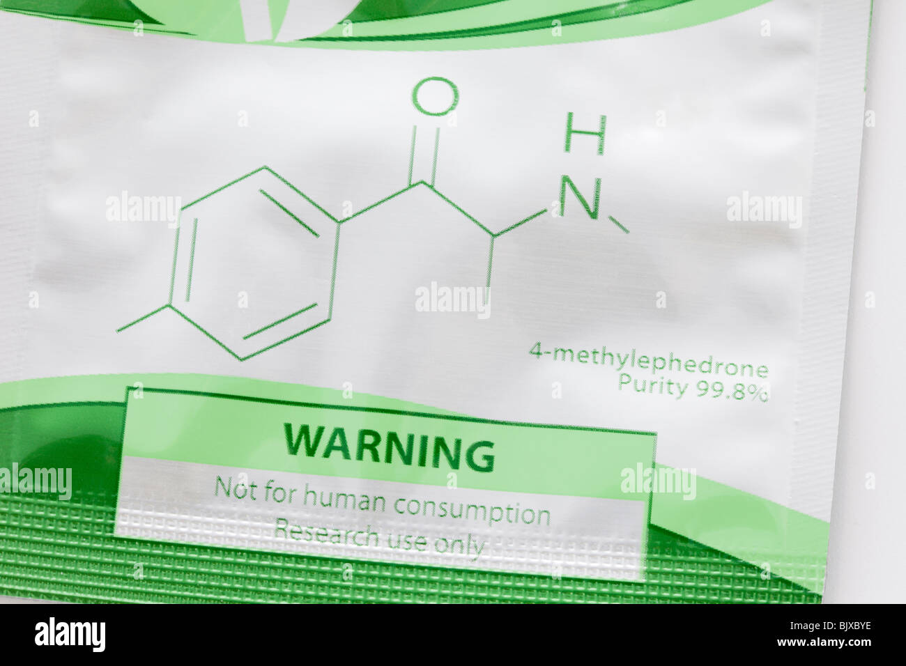 Chemical formula symbol of Mephedrone packet of plant food with warning 'not for human consumption'. Stock Photo