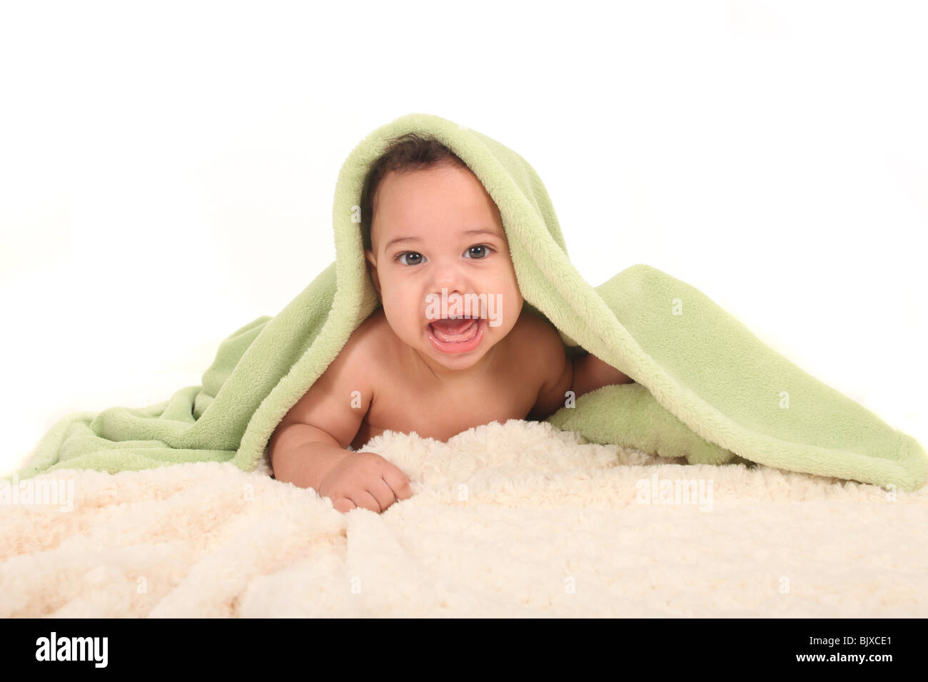 Happy Baby Boy With Blankets on a White Background Stock Photo - Alamy