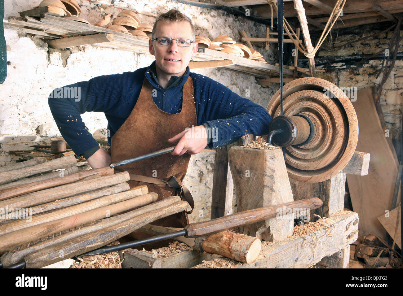 Woodturner Robin Wood and bowls in his workshop at Edale in the Peck  District using a foot powered pole lathe Stock Photo - Alamy
