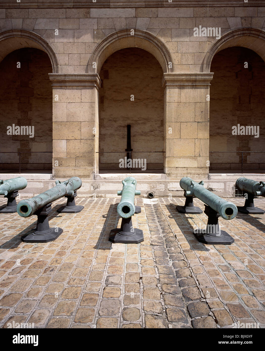 Cannons in front of building Stock Photo