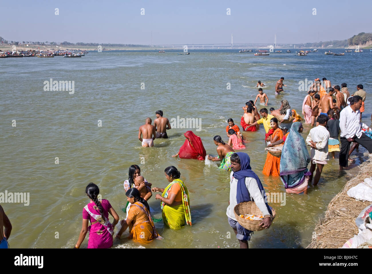 Hindu pilgrims bathing in the Ganges river. Allahabad. India Stock Photo