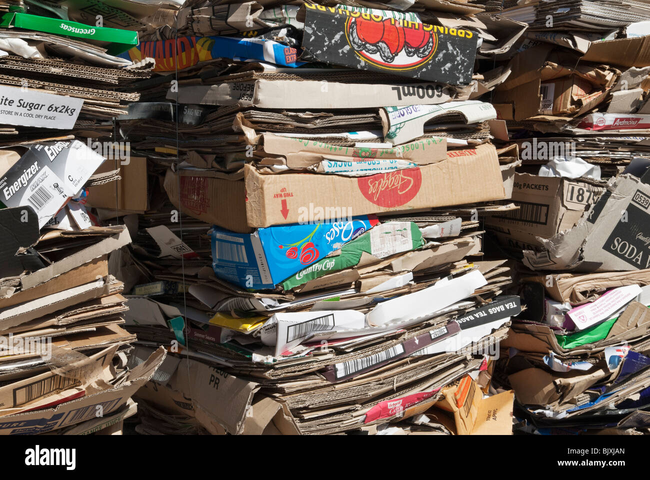 Stacks of cardboard boxes compressed ready for recycling Stock Photo