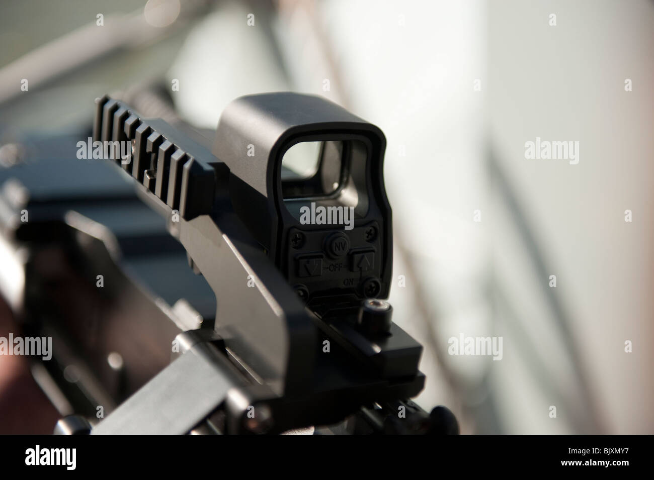 Laser gun sight on large military gun Stock Photo Alamy