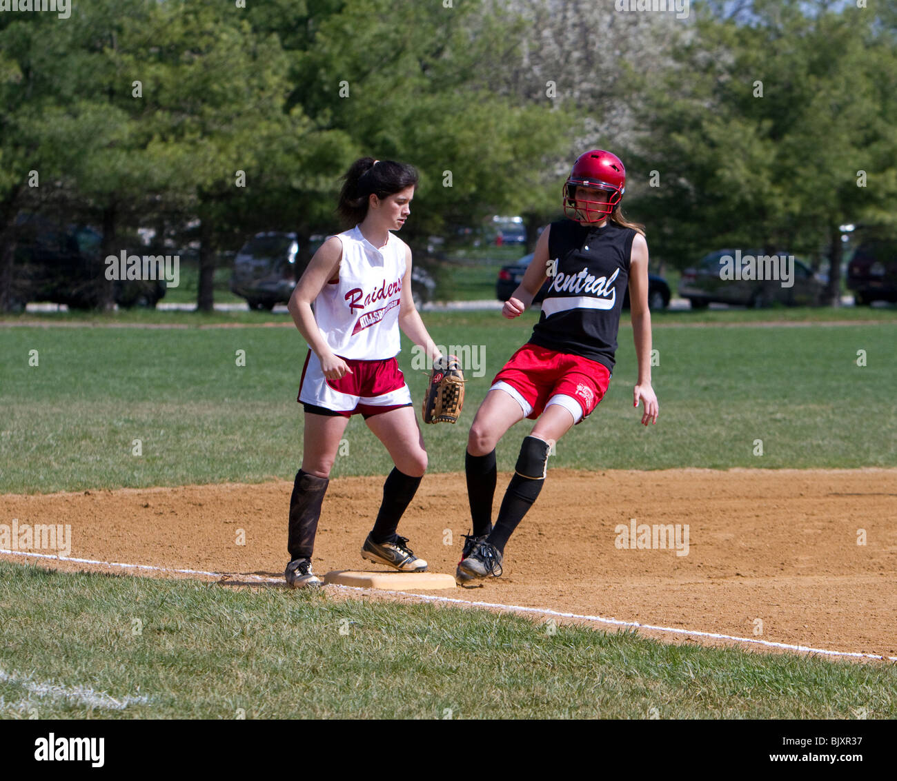 Girls high school softball game Stock Photo Alamy