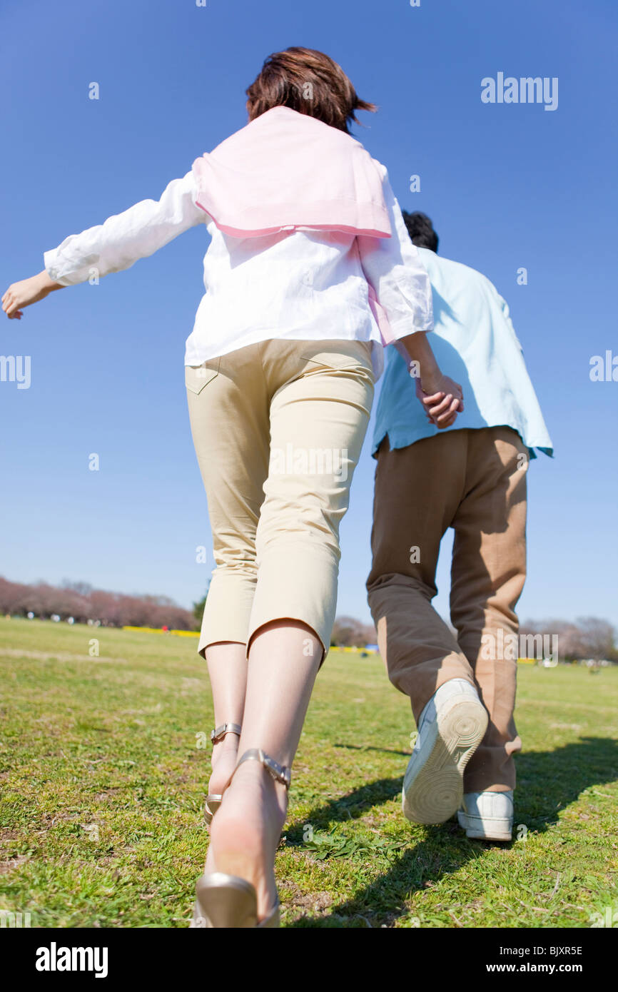 Young asian men holding hands hi-res stock photography and images - Alamy