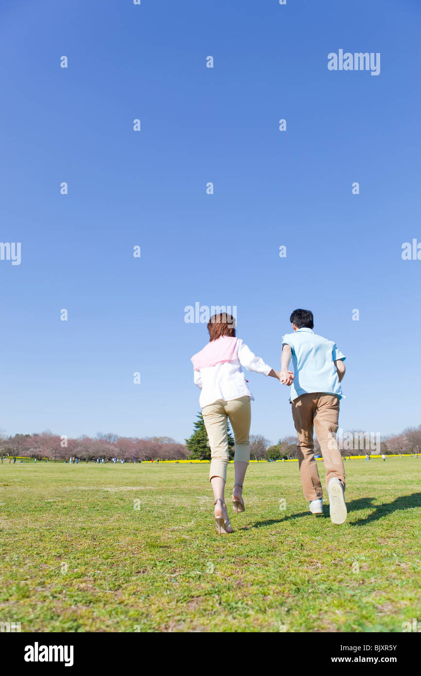 Young asian men holding hands hi-res stock photography and images - Alamy